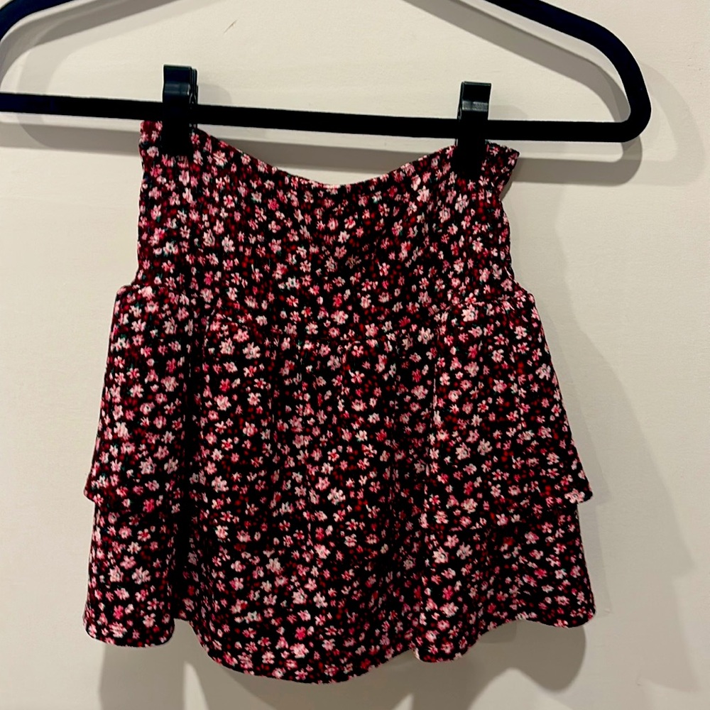 Super comfortable tiered floral skirt with elastic waistband.